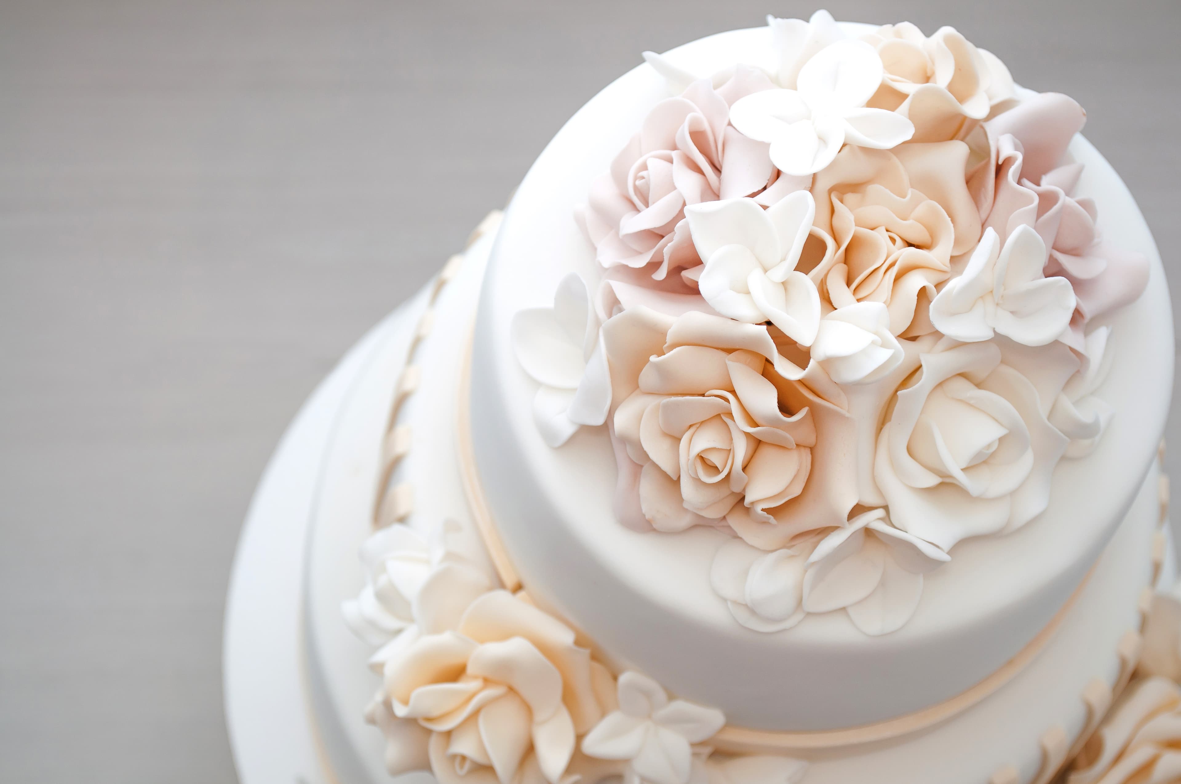 Wedding cake with sugar petals on top